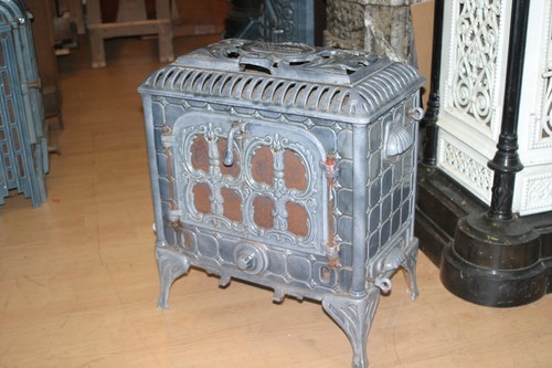 Gussofen kanonenofen art deco - art,